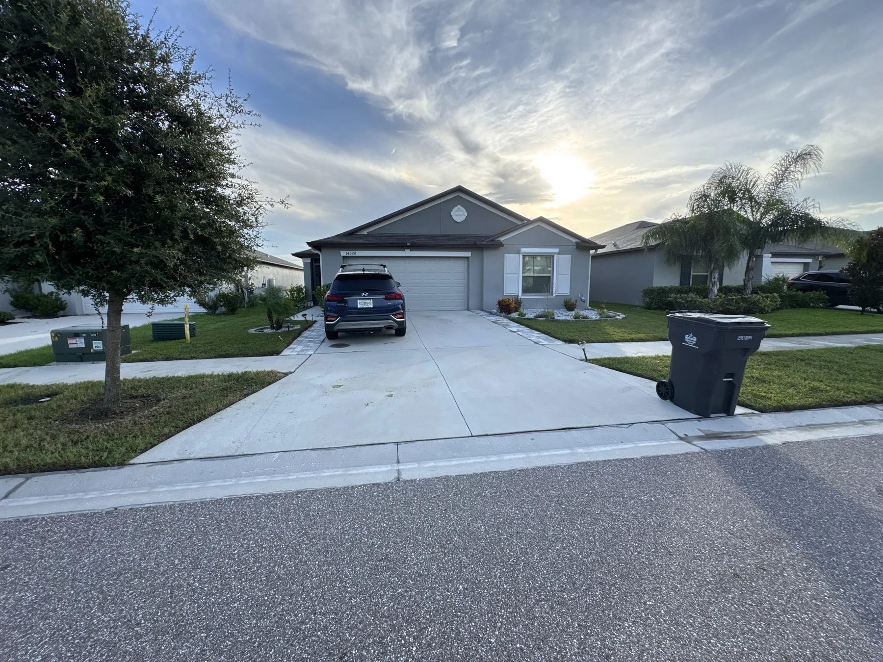 Evening view of a neatly maintained residential lawn