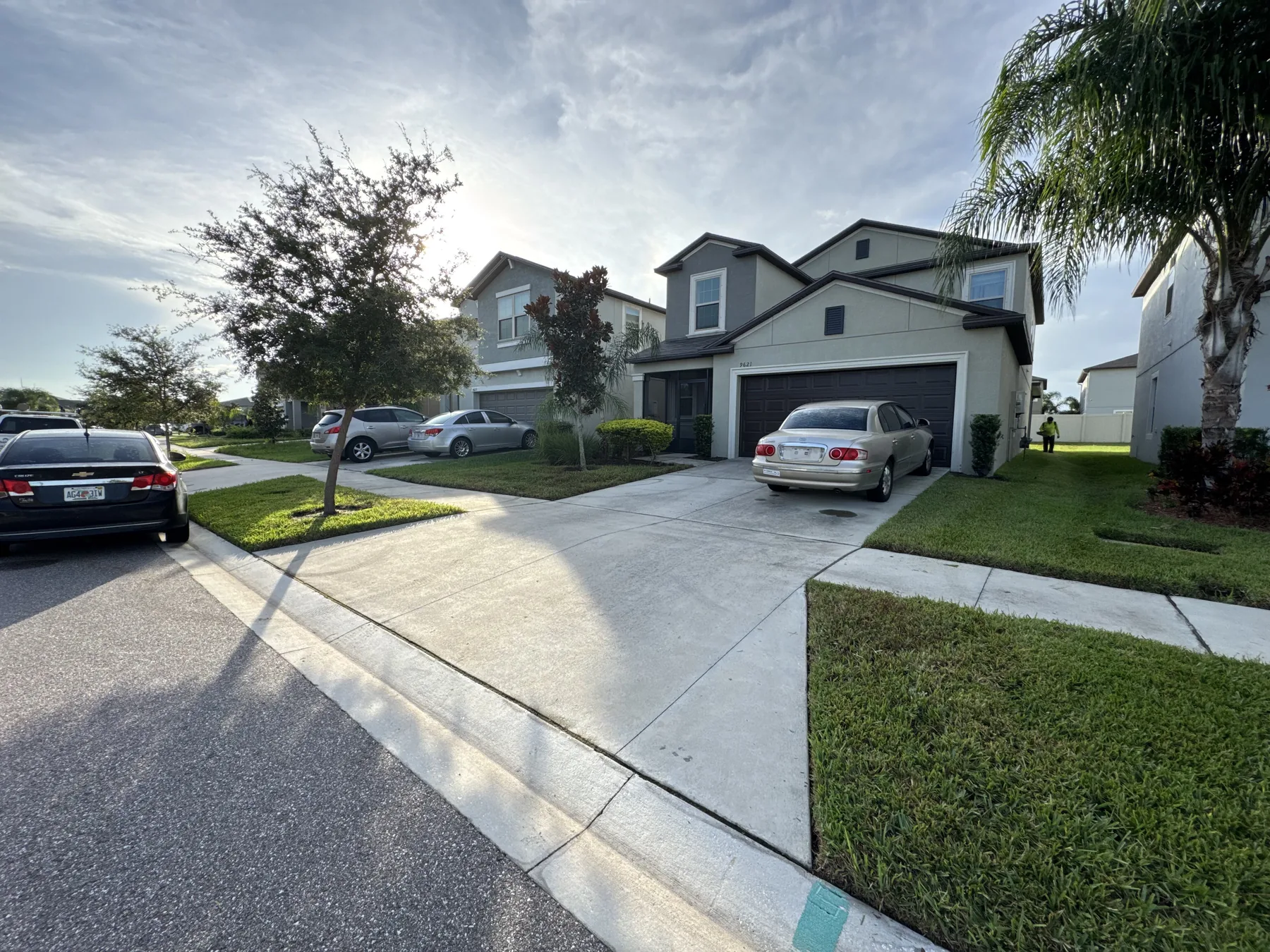 Clean lawns and driveways across a residential block